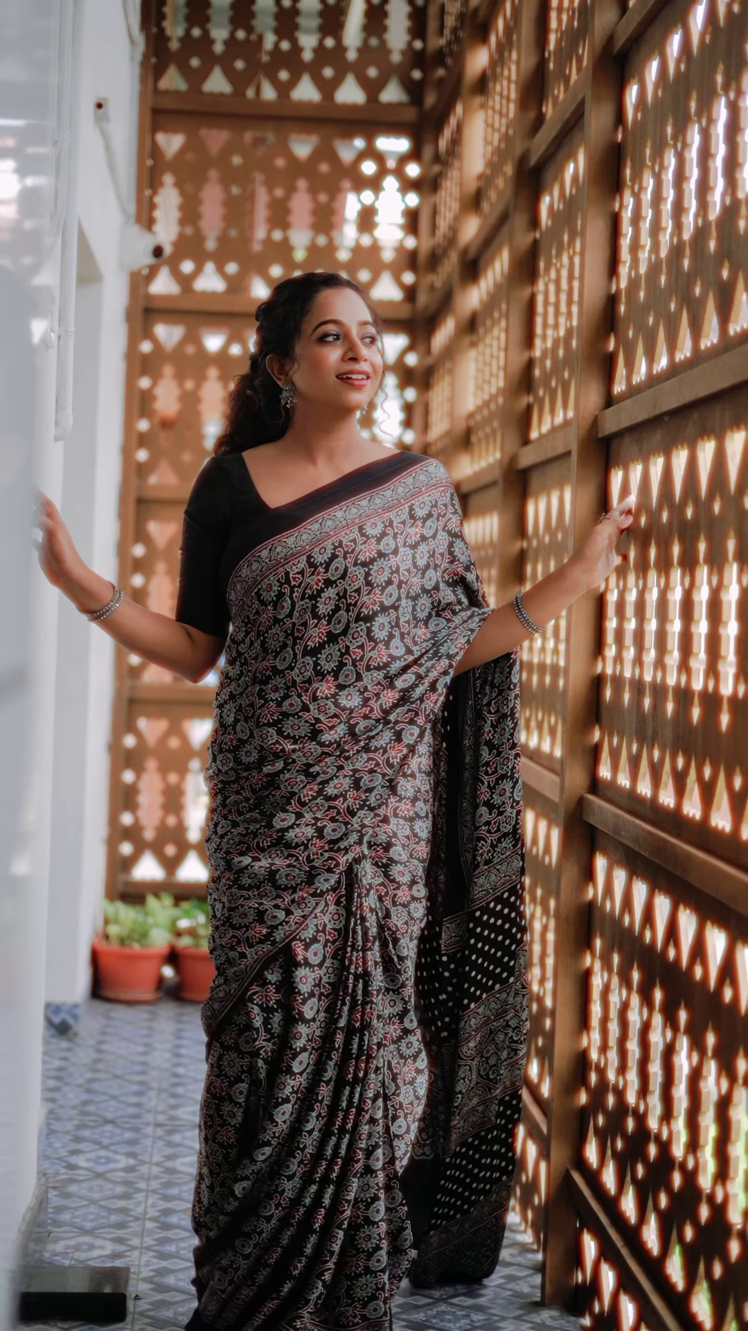 Black colored poly cotton ready to wear saree