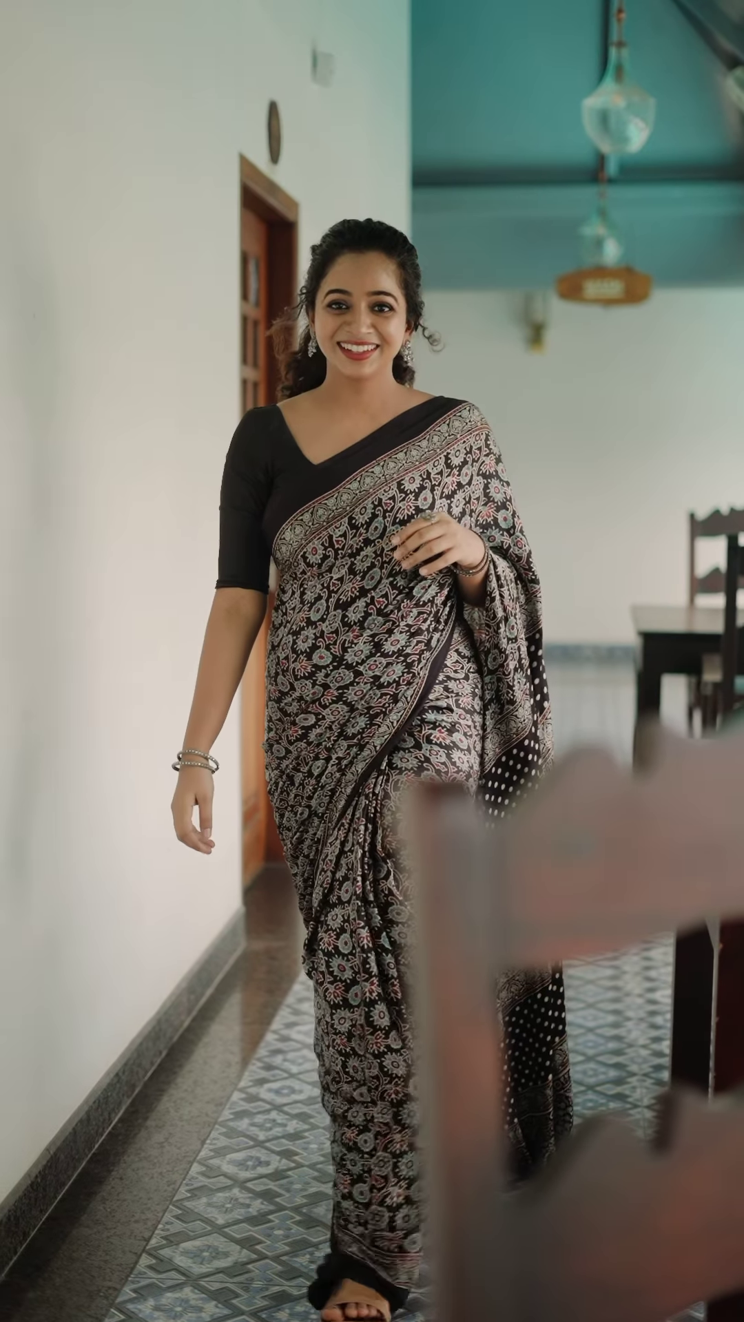 Black colored poly cotton ready to wear saree