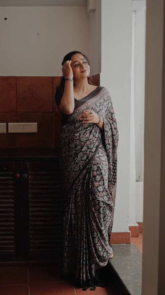 Black colored poly cotton ready to wear saree